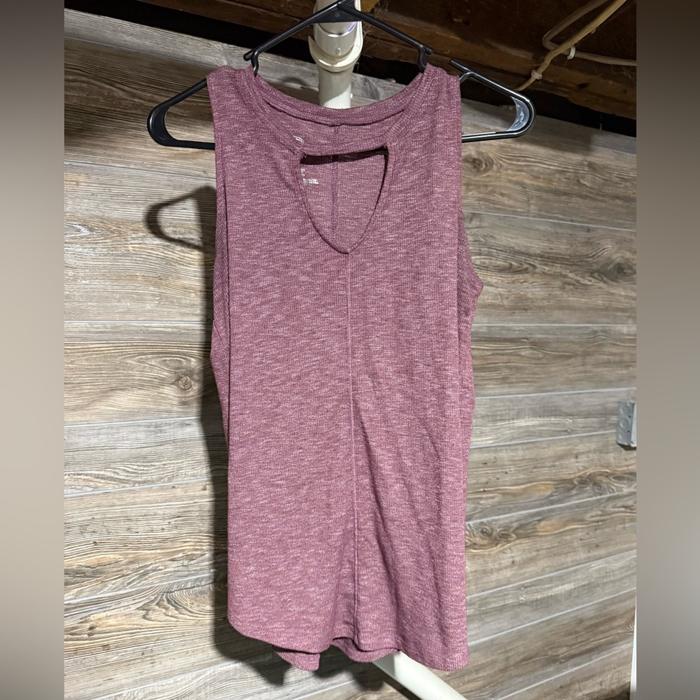 Maurice’s tank top with cleavage peep